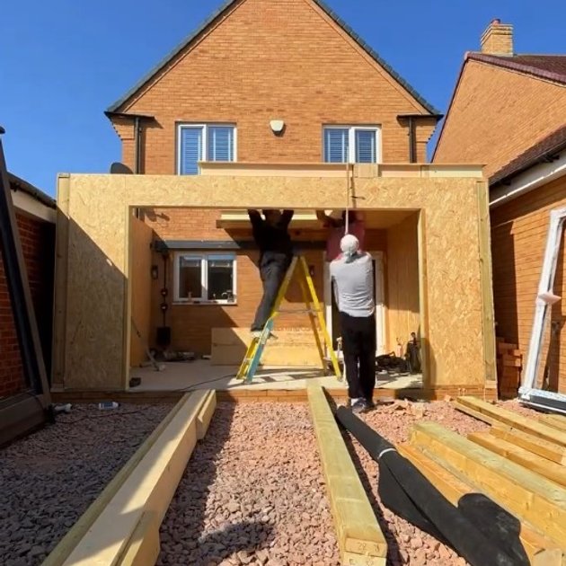 the team conducting a house extension