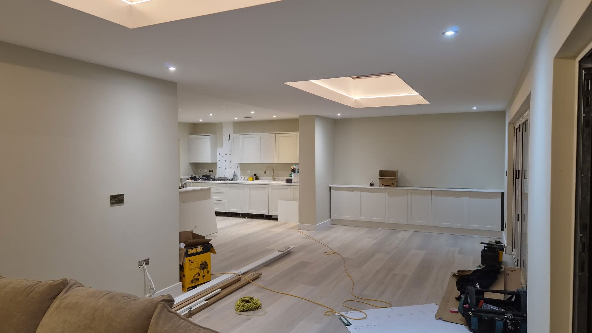 Open-plan kitchen and living extension with recessed LED ceiling features, Milton Keynes SIP build